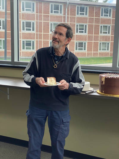 Alex with his retirement cake