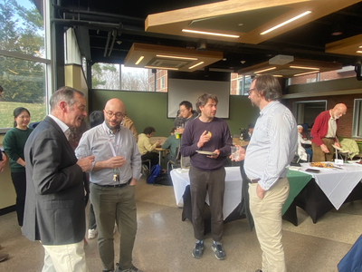 Faculty conversation at the post-lecture reception Faculty conversation at the post-lecture reception